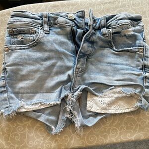 A pair of size 00 American Eagle shorts.